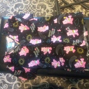 Care Bears size XS scrub top. Has been gently worn.